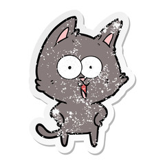 distressed sticker of a funny cartoon cat