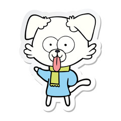 Obraz premium sticker of a cartoon dog in winter clothes