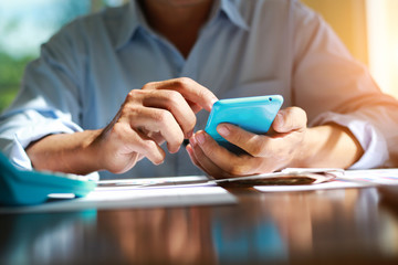Businessmen using mobile phone for Shopping online By credit card in office.cconcept
