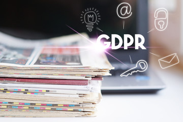 GDPR. Data Protection Regulation. Cyber security and privacy. Laptop and Newspapers, Concept for...