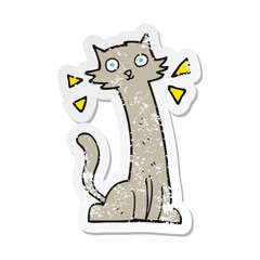 retro distressed sticker of a cartoon cat