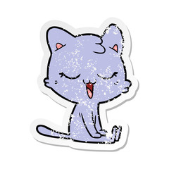 distressed sticker of a cartoon cat