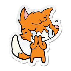 Obraz na płótnie Canvas sticker of a crying fox cartoon