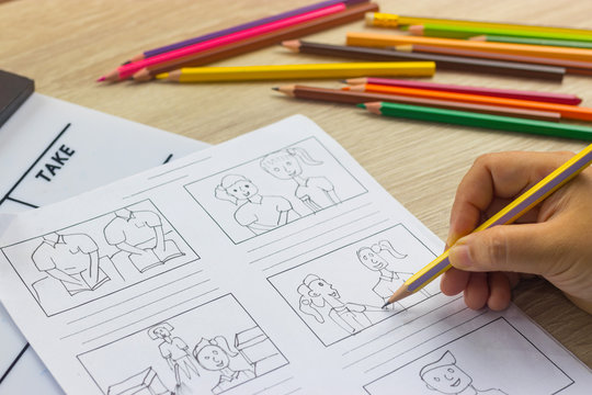 Storyboard drawing with pencil creative sketch cartoon. Storyboarding is process image displayed in sequence for purpose of pre-visualizing motion picture, interactive media. Concept sketching ideas.
