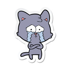 sticker of a cartoon crying cat