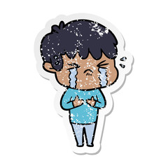 distressed sticker of a cartoon boy crying
