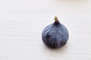 Fresh fig on brown  wooden