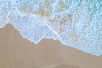 Fototapeta na wymiar Sea wave snad beach summer background