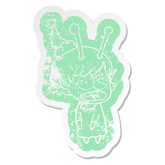 cartoon distressed sticker of a shocked alien girl wearing santa hat