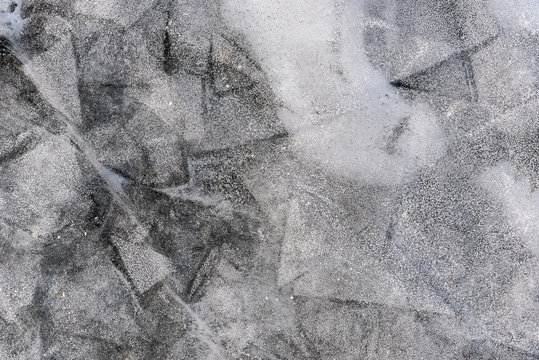 Background Frozen Gas Bubbles In The Frozen Ice Of The Lake And River In Winter