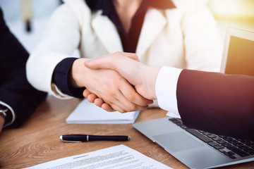 Business people shaking hands at meeting or negotiation in the office. Handshake concept. Partners are satisfied because signing contract