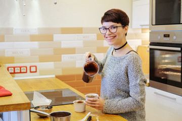 Portrait of woman cooking dessert.