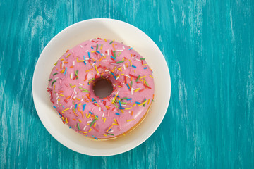 dessert glazed doughnut with sprinkles