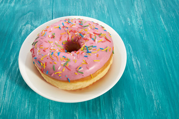 dessert glazed doughnut with sprinkles