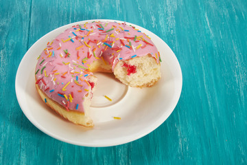 dessert glazed doughnut with sprinkles