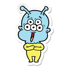 sticker of a happy cartoon alien