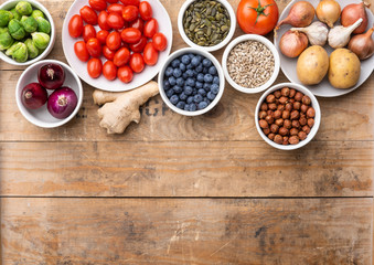 Healthy eating ingredients: fresh vegetables, fruits and superfood. Nutrition, diet, vegan food concept