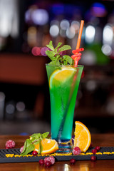 beautiful, bright spring-summer cocktails made from freshly squeezed fruits and vegetables, on a loft background, for use in design