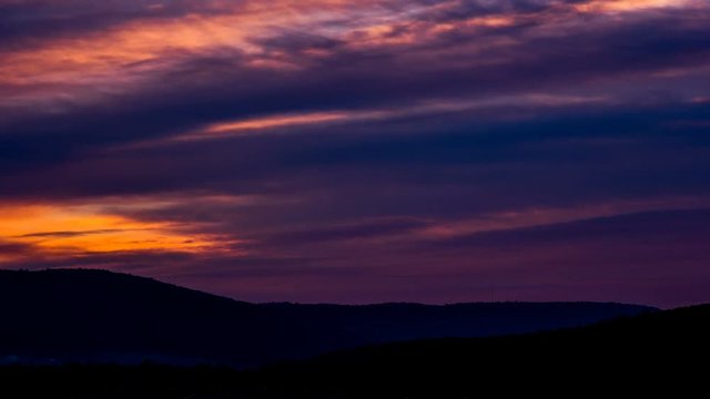 4K Twilight timelapse sky clouds purple dark night transition. Cinematic atmospheric scenic beauty dramatic ethereal serene tranquil time lapse footage. Background video