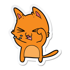 sticker of a cartoon cat hissing