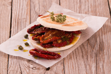 Tigella bread with sun-dried tomatoes.