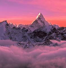 Greatness of Nature concept. Ama Dablam peak (6856 m) at sunrise. Nepal, Himalayas.