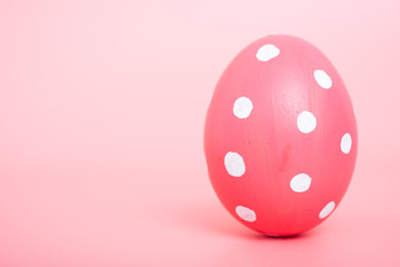 Beautiful Easter Pink egg color on pink background,