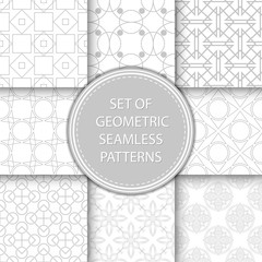Compilation of seamless patterns. Gray abstract and geometric prints on white backgrounds