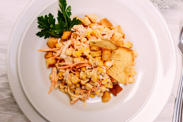 Salad with corn, rice and Croutons