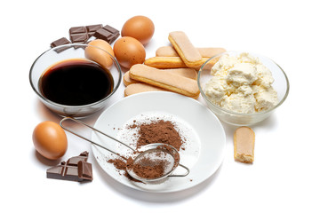 Ingredients for cooking tiramisu - Savoiardi biscuit cookies, mascarpone, cream, sugar, cocoa, coffee and egg