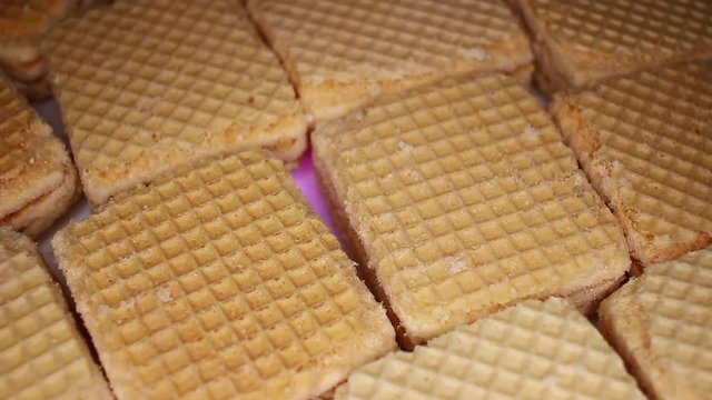 Wafer wafers closeup texture video on rolling rotating looping plate
