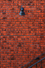 Lighting fixtures installed on the brick wall