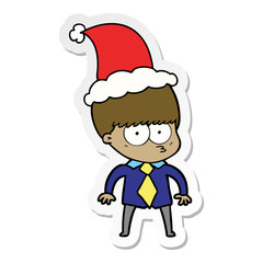 nervous sticker cartoon of a boy wearing shirt and tie wearing santa hat