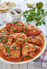 chargrilled Chicken stewed in Coconut milk gravy
