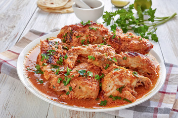 chargrilled Chicken stewed in Coconut milk gravy