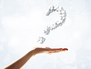 Answer all your questions concept presented by question sign in palm. Mixed media