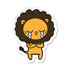 sticker of a crying cartoon lion