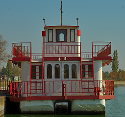 Front view on a white and red raft that look like a boat