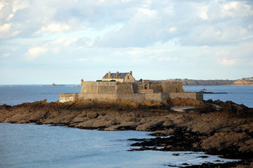 Fototapeta na wymiar Fort National - fortress on tidal island Petit Be in Saint-Malo. Fort was built in 17th century to protect city. Saint-Malo is a port city in Brittany in France on English Channel