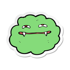 sticker of a cartoon vampire cloud