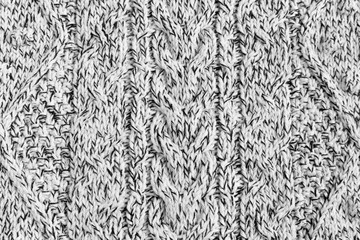 melange cotton knitted fabric texture background. black and white thread. real photo