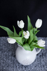 white tulips in a vase