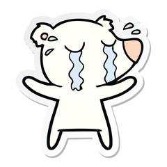 sticker of a cartoon crying polar bear