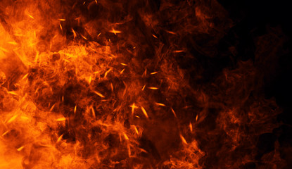 Fototapeta na wymiar Fire, heat, passion, texture. Fire particles embers background . Design element.