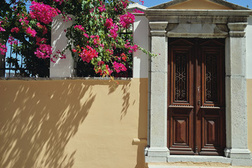 Old door in a Greek village on Symi island. Greece