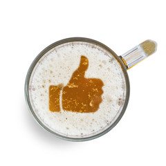 Sign Like, thumb up, on the beer foam in glass isolated on white background. Top view