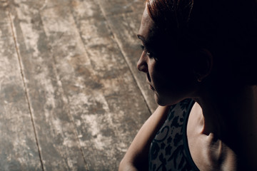 Edge lit profile woman portrait.