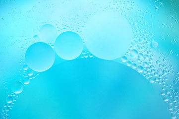 Blue colored abstract background with bubbles