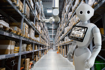 Modern robot with integrated digital tablet and robotic arm in warehouse store stock.