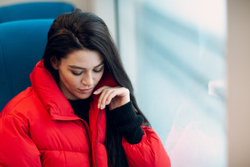 Young female and railway train.